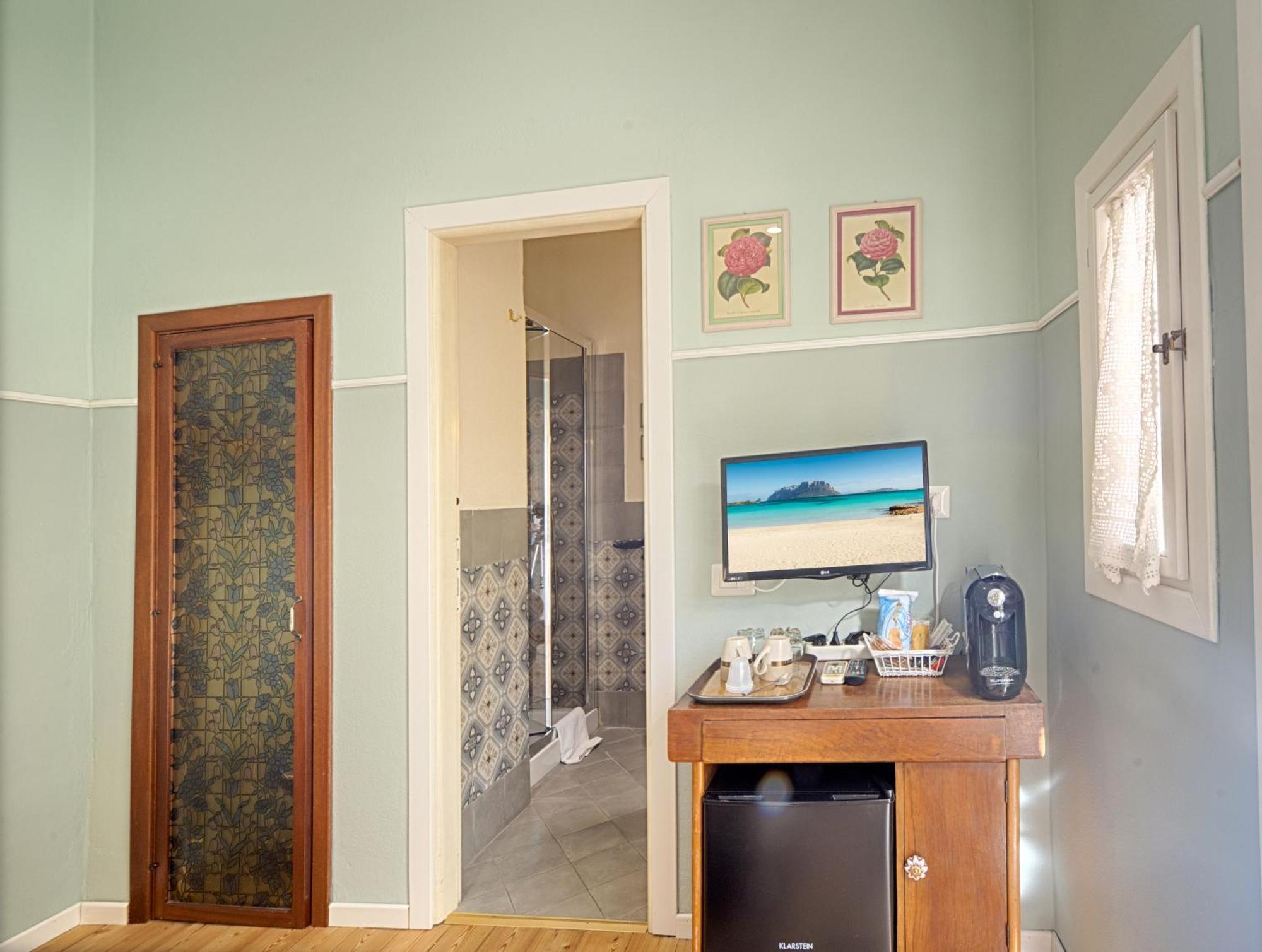 Hotel Casa Satta 1925 à Olbia Chambre photo